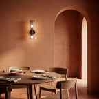 Twin Coloured Glass Shade Wall Light on a dining room wall