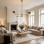 Two Arm Bowl Shade and Ball Chandelier above a coffee table in a living room in daylight