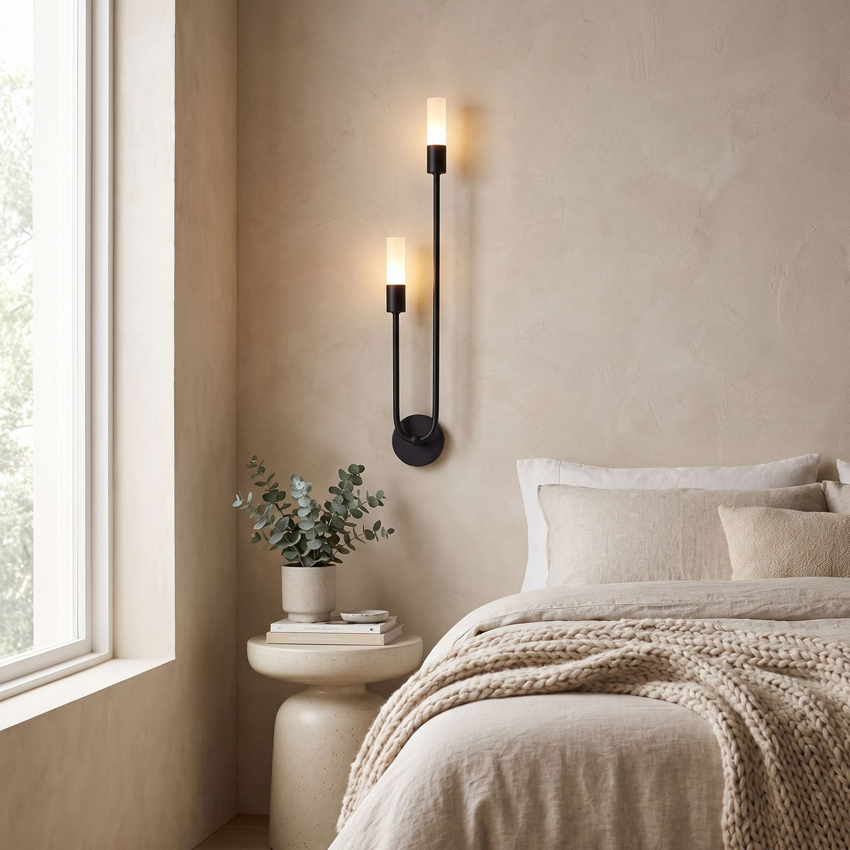 Two-Arm Iron and Acrylic Tube Wall Light on a bedroom wall beside the bed