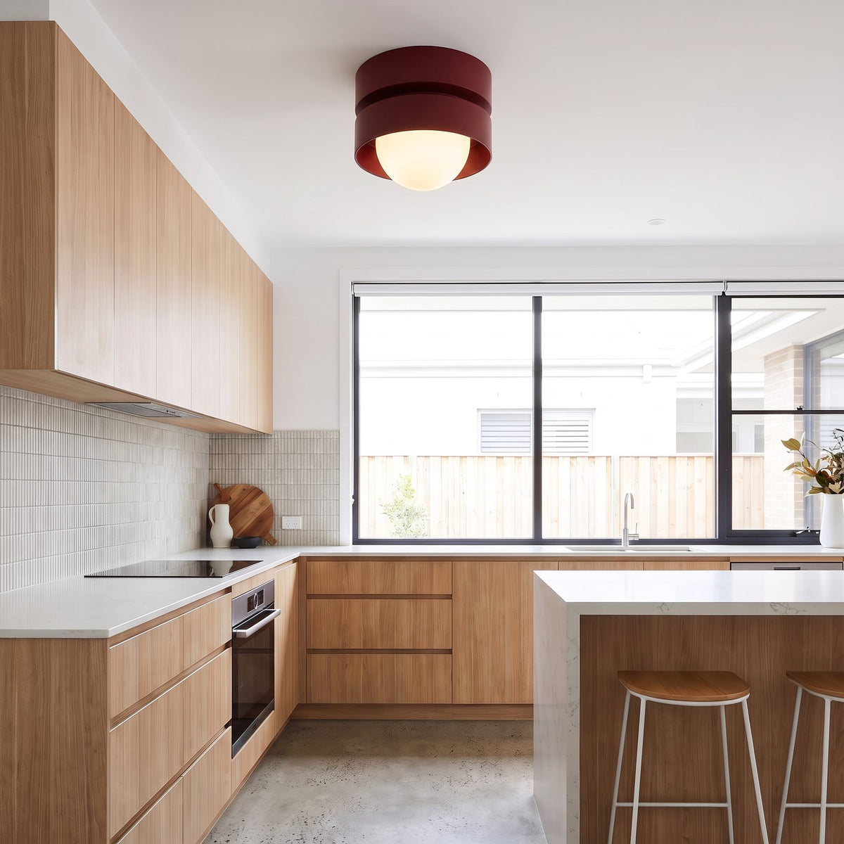 Two-Tier Resin Drum and Opal Globe Ceiling Light in red on a bedroom ceiling