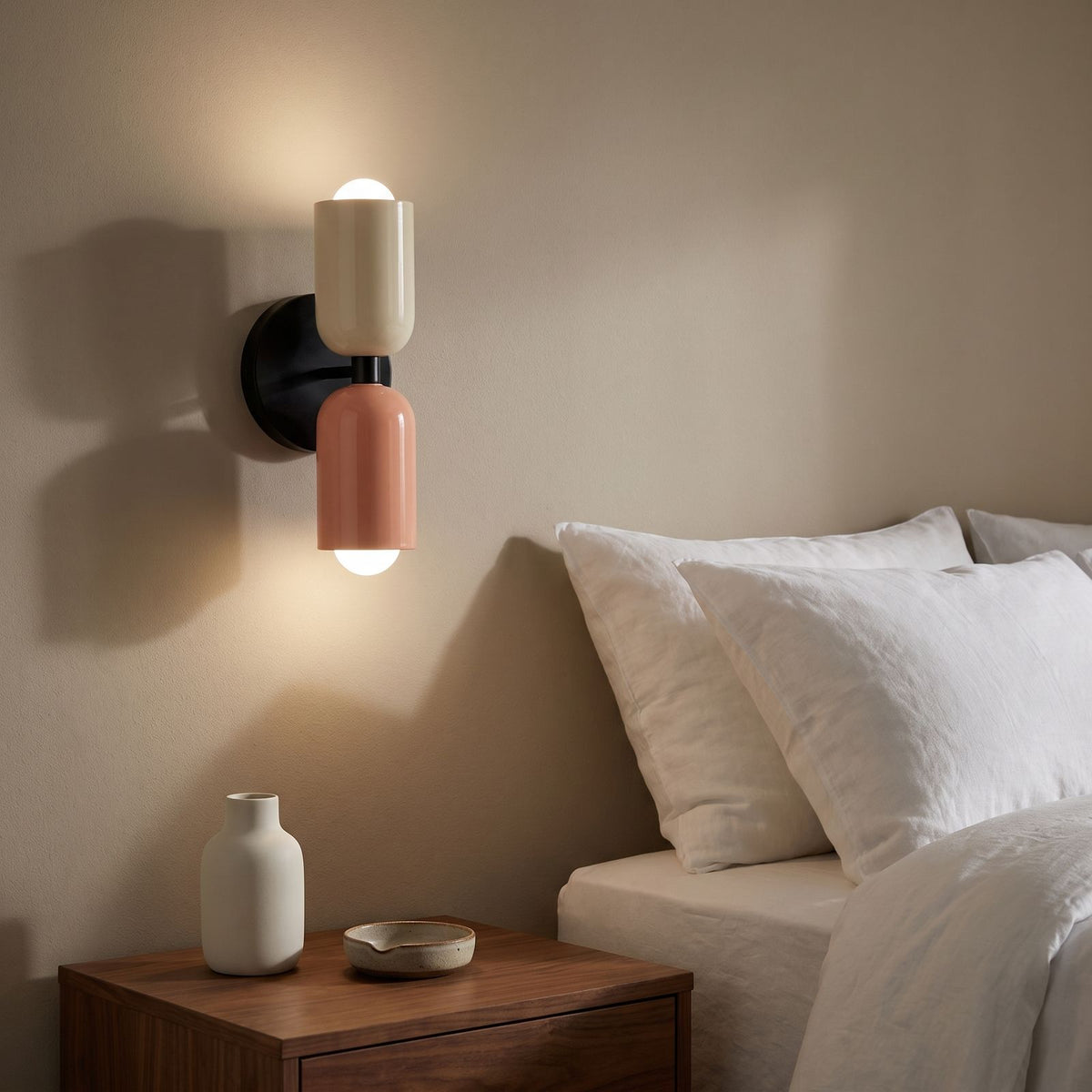 Two Tone Double Head Iron Wall Light beside a bed at night