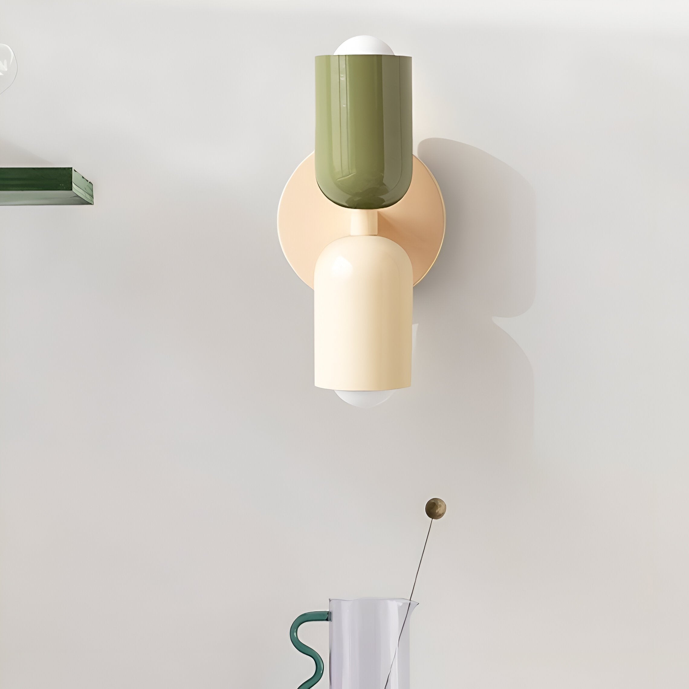 Two tone double head wall light on a white wall