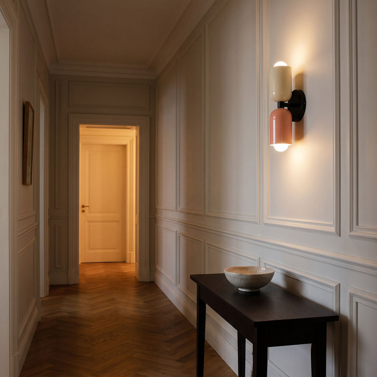 Two Tone Double Head Iron Wall Light in a panelled hallway