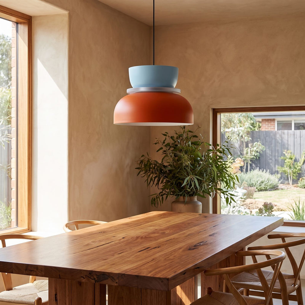 Two-Tone Stacked Metal Bowl Pendant Light above a timber dining table