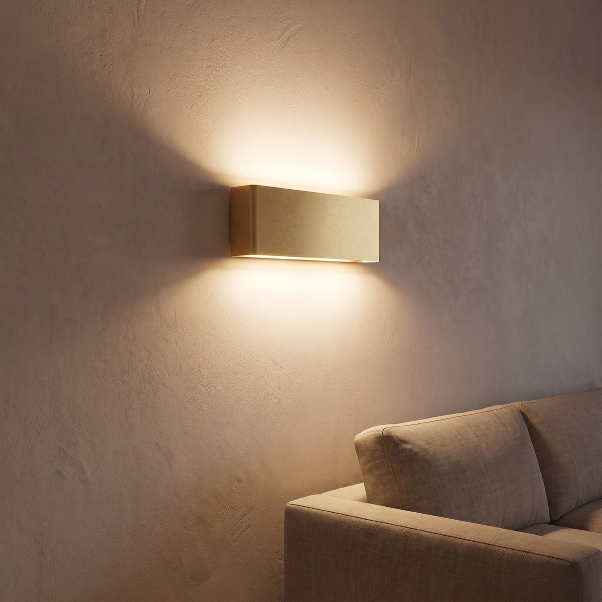 Ultra-thin up down LED wall light beside a living room sofa at night