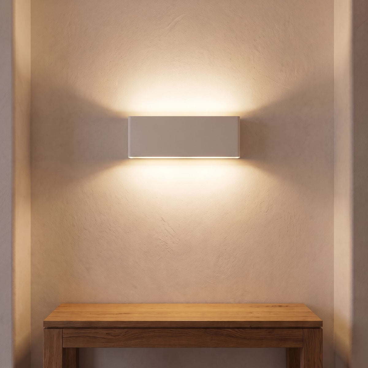 Ultra-Thin Brushed Aluminium Up Down LED Wall Light in white above an entry console