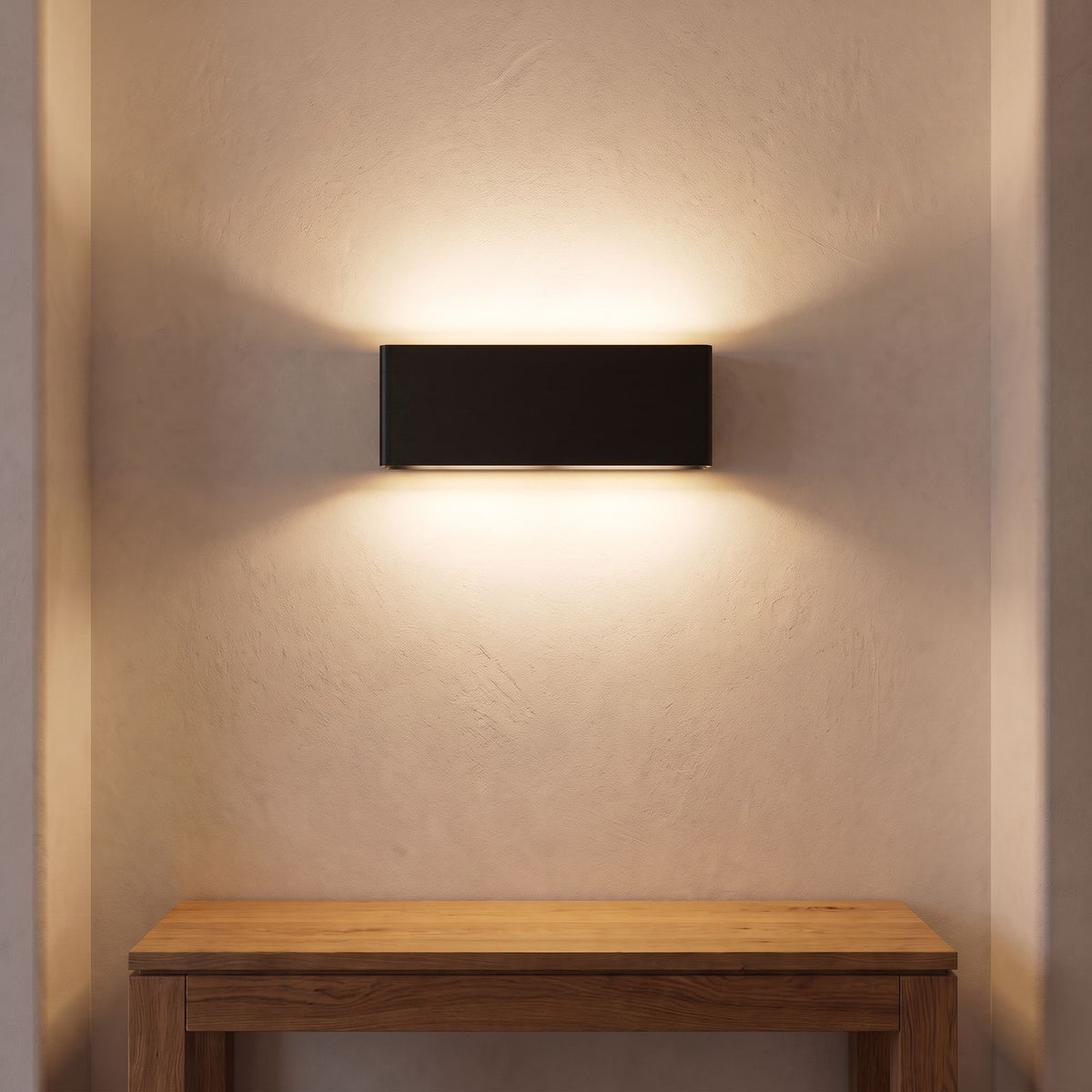 Ultra-Thin Brushed Aluminium Up Down LED Wall Light in black above an entry console