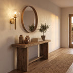 Upturned Glass Globe Wall Light in a hallway above a timber console