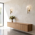Upturned Glass Globe Wall Light in a pair on a wall of an Australian home