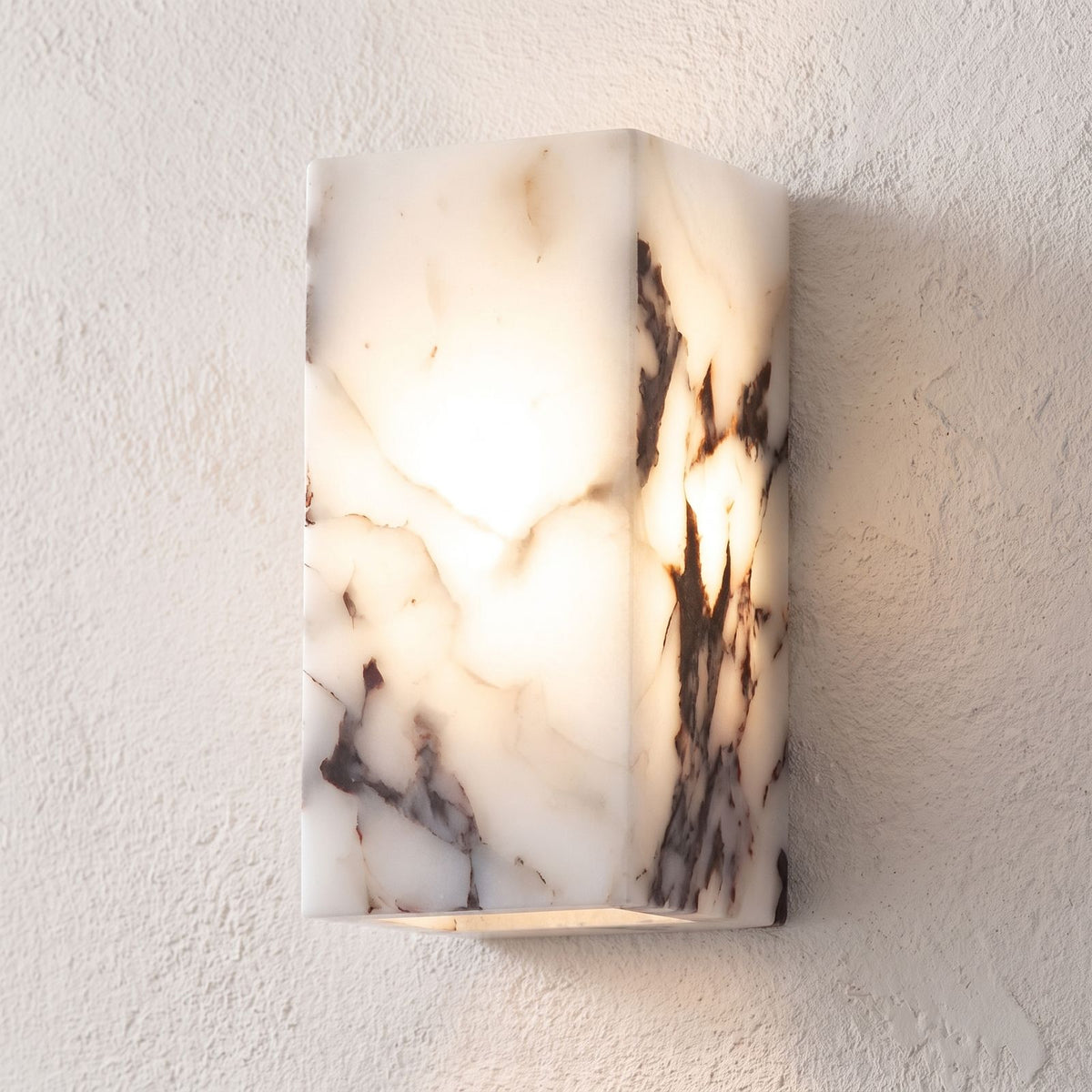 Veined Marble Block LED Wall Light, close view at 45 degrees on a plaster wall