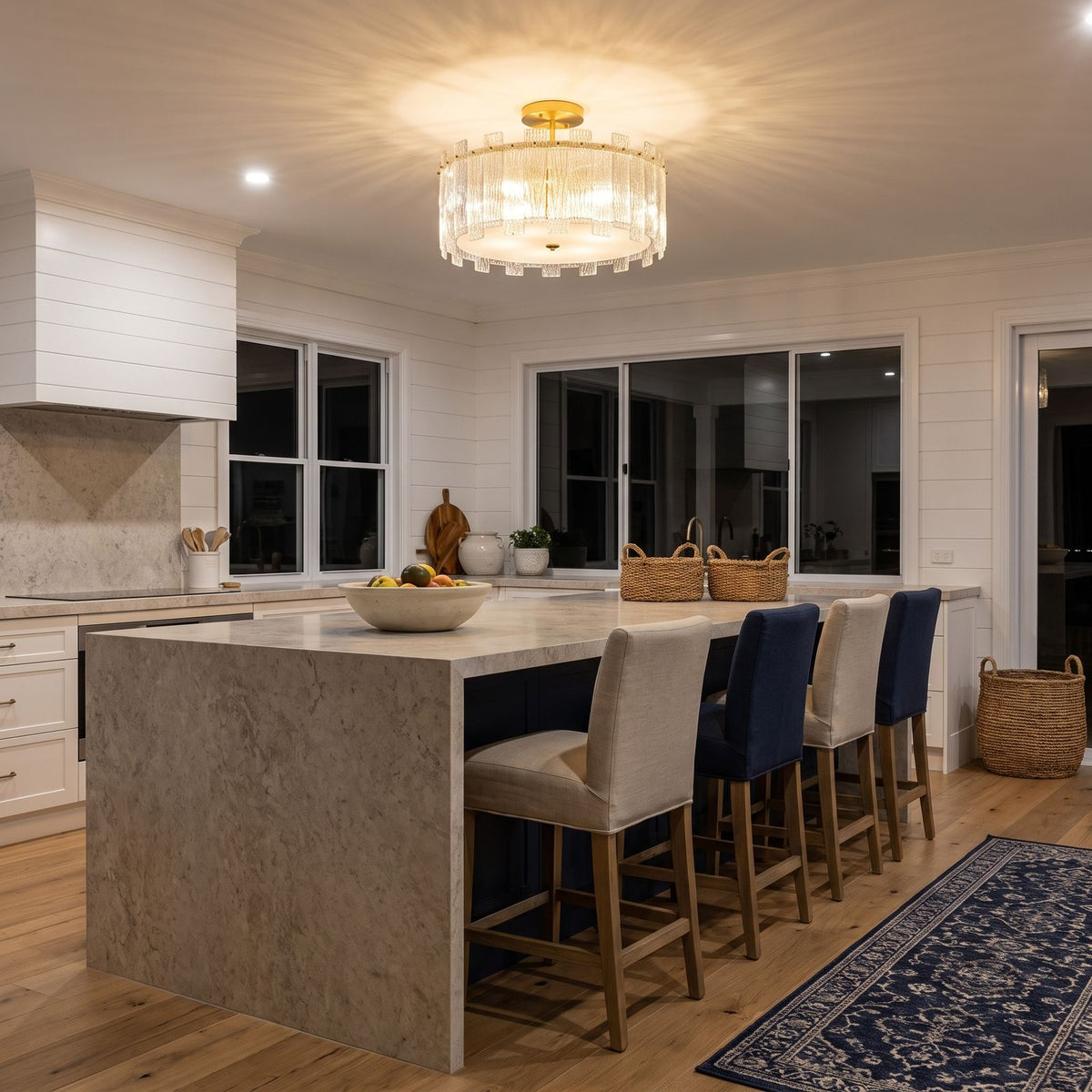 Vertical Textured Glass Drum Semi-Flush Ceiling Light above a kitchen island at night