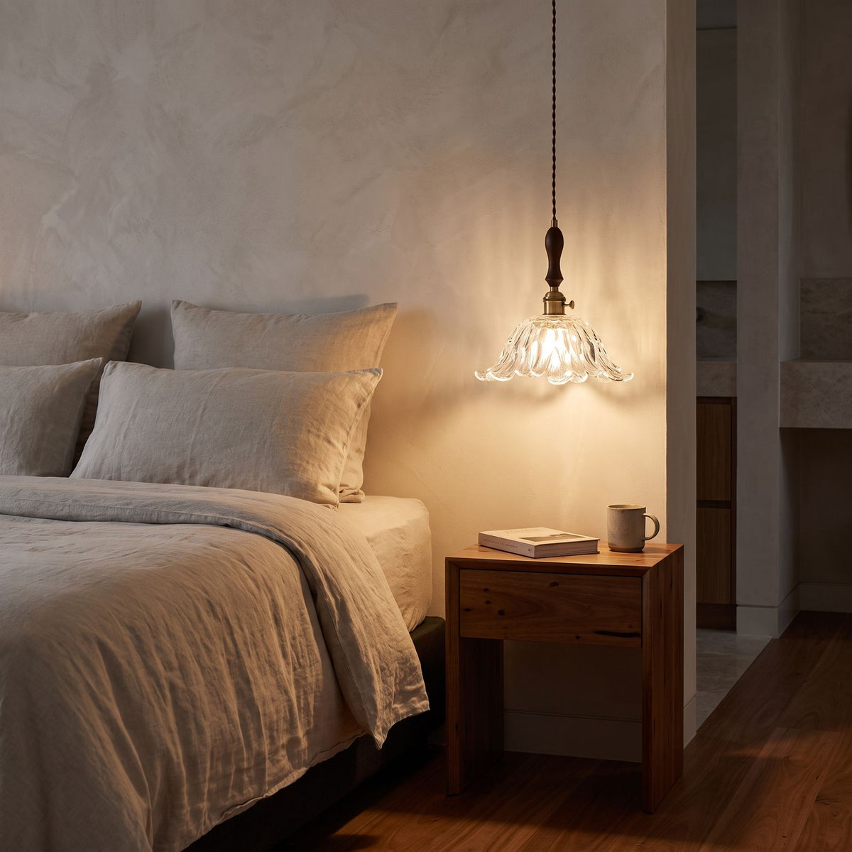 Vintage Flower Petal Glass Pendant Light hanging beside a bed