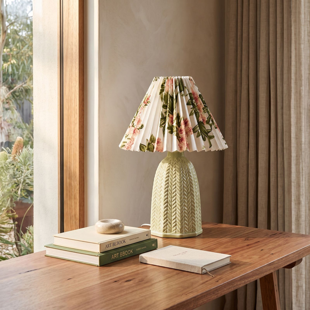 Vintage Light Green Ceramic Pleated Table Lamp on a study desk