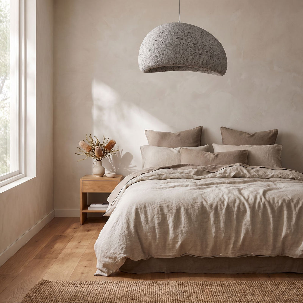 Wabi Sabi Fibreglass Resin Pendant Light above a bed