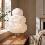 Wabi-Sabi Rice Paper Tripod Table Lamp, close view on a timber surface