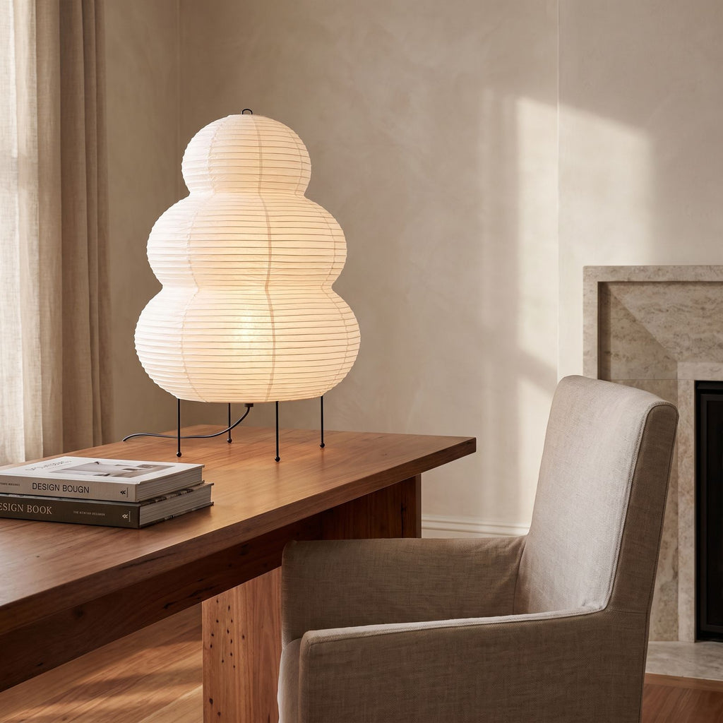 Wabi-Sabi Rice Paper Tripod Table Lamp on a study desk