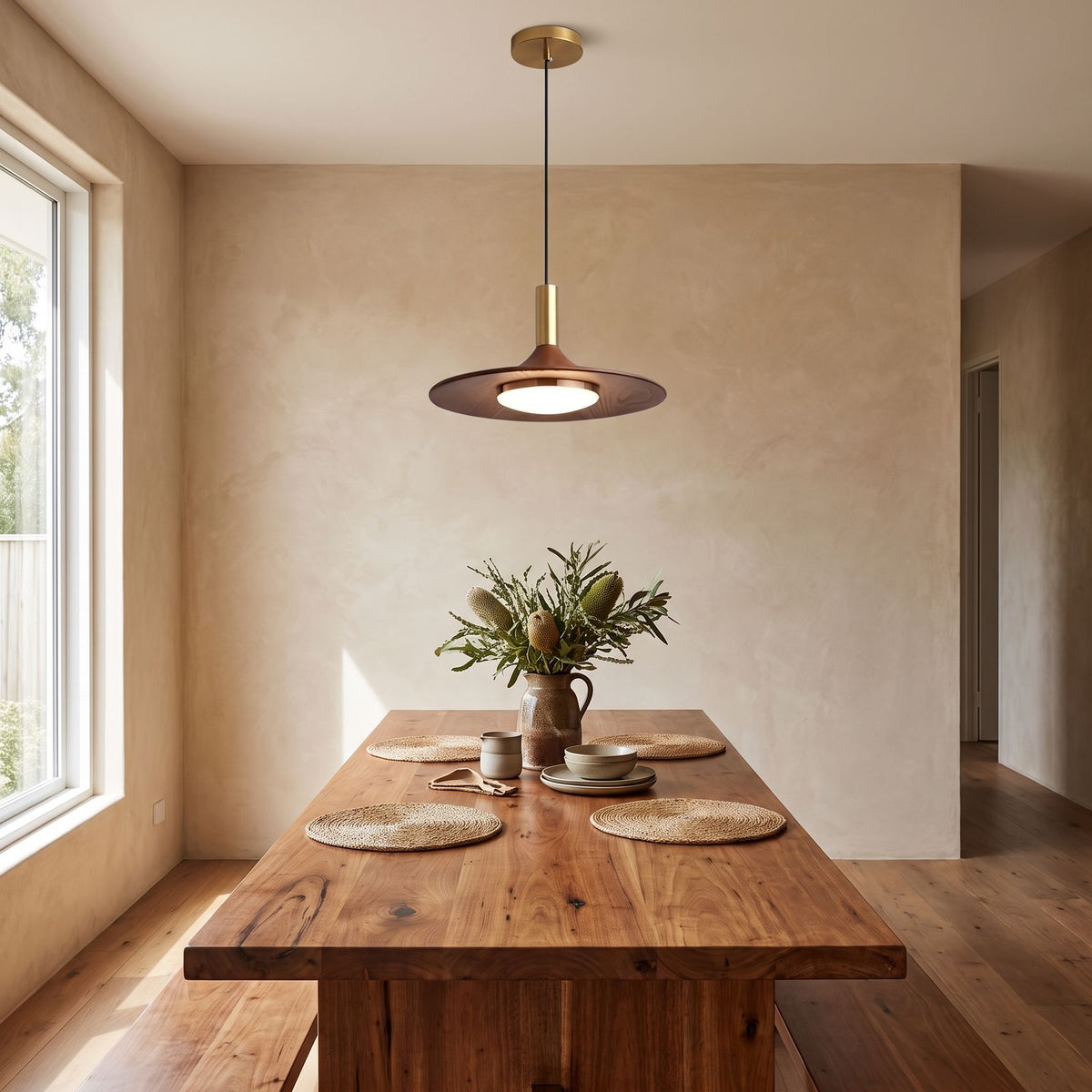 Walnut Finish Wide Brim Iron LED Pendant Light above a timber dining table