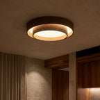 Walnut-Look Acrylic LED Ceiling Light glowing on a ceiling at night