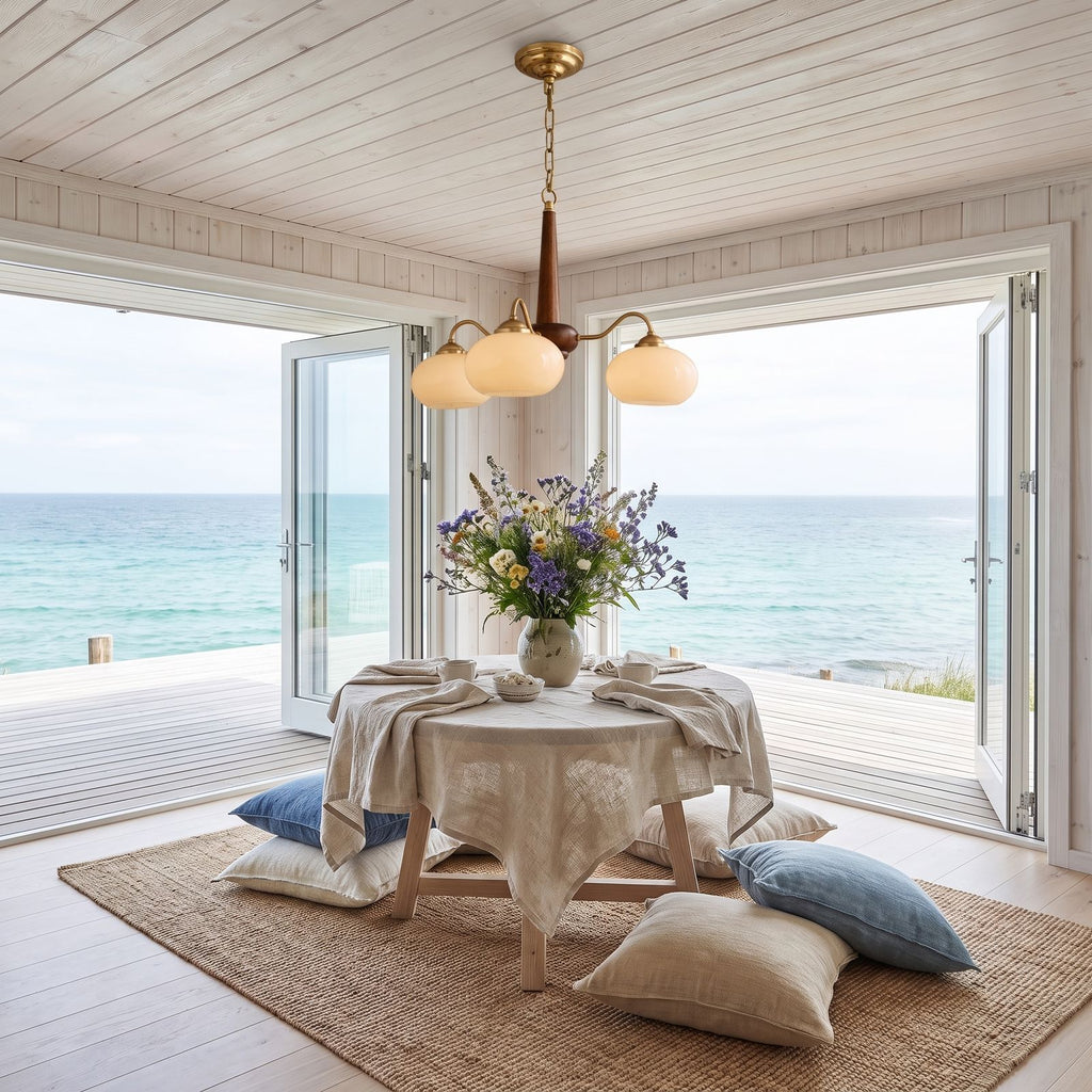 Walnut Wood and Brass Arm Glass Shade Chandelier in a styled bedroom in soft daylight
