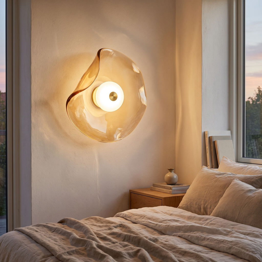 Wavy Art Glass Disc LED Wall Light beside a bed