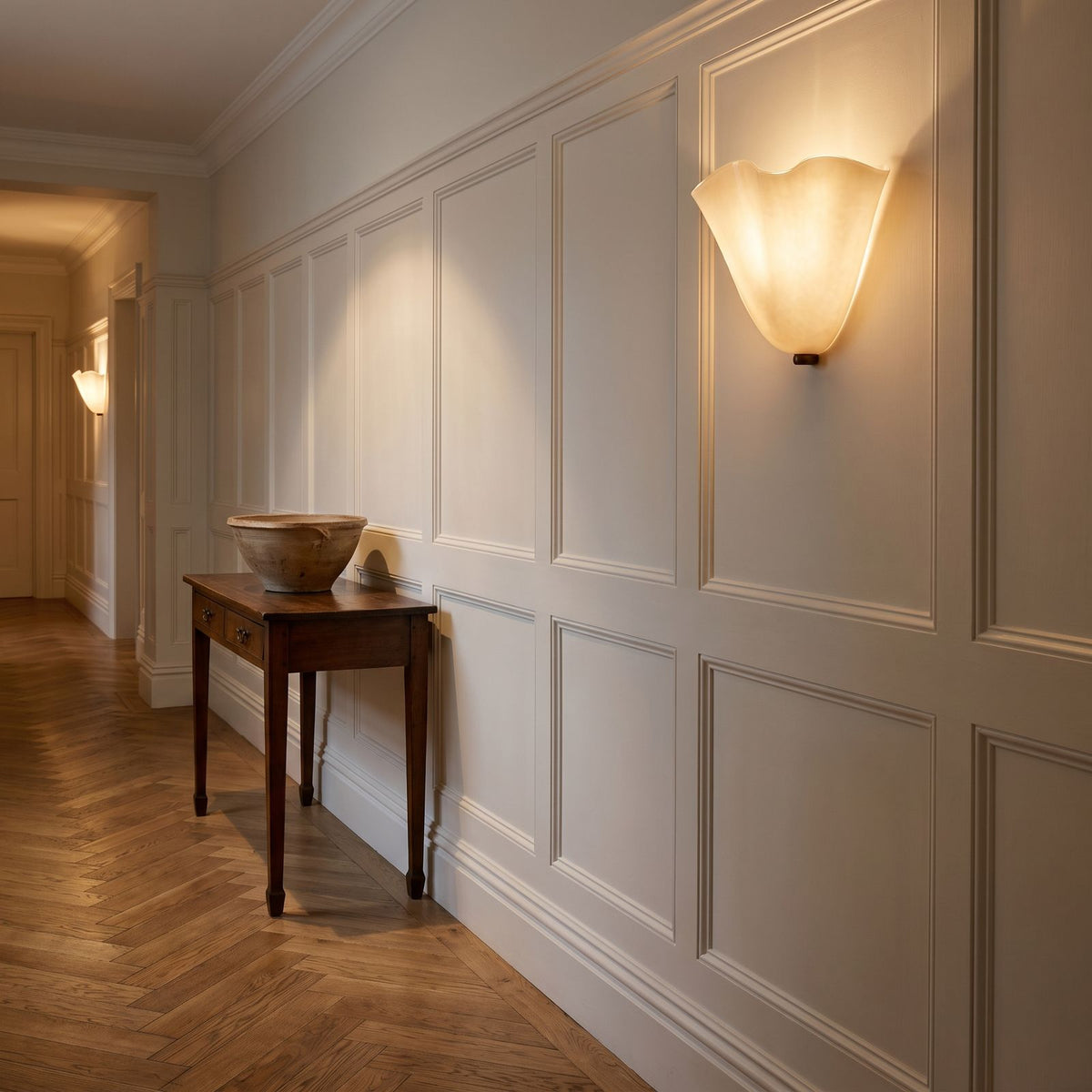 Wavy Beige Glass Shell Wall Light in a panelled hallway