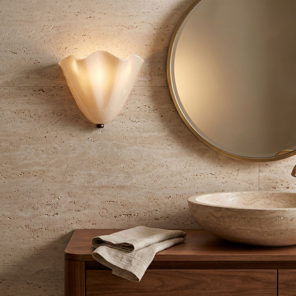 Wavy Beige Glass Shell Wall Light in a travertine powder room