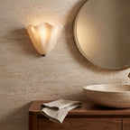 Wavy Beige Glass Shell Wall Light in a travertine powder room