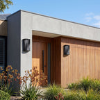 Wavy Openwork Stainless Steel Outdoor Wall Light in a pair on the facade of an Australian home