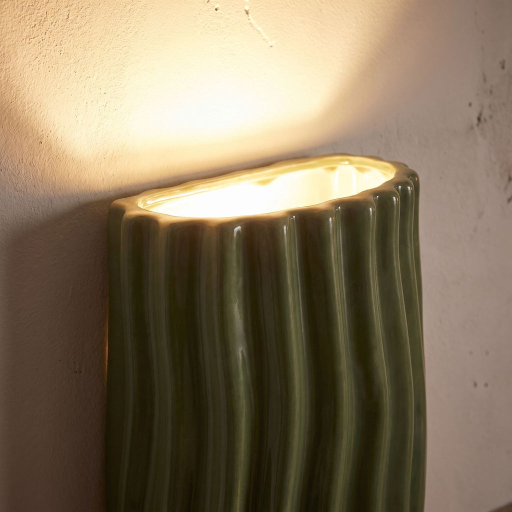 Close-up of the wavy ribs of the green resin