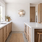White Alabaster Halo Wall Light on a kitchen wall