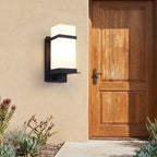 White Glass Black Iron Outdoor Wall Light beside a timber front door