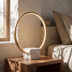 White Marble and Copper LED Table Lamp, close view on a timber surface