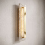 Wide Alabaster Panel Brass Wall Light, close view at 45 degrees on a plaster wall