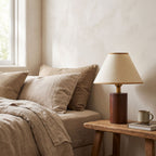 Wood Base Cone Shade Bedside Table Lamp on a bedside table