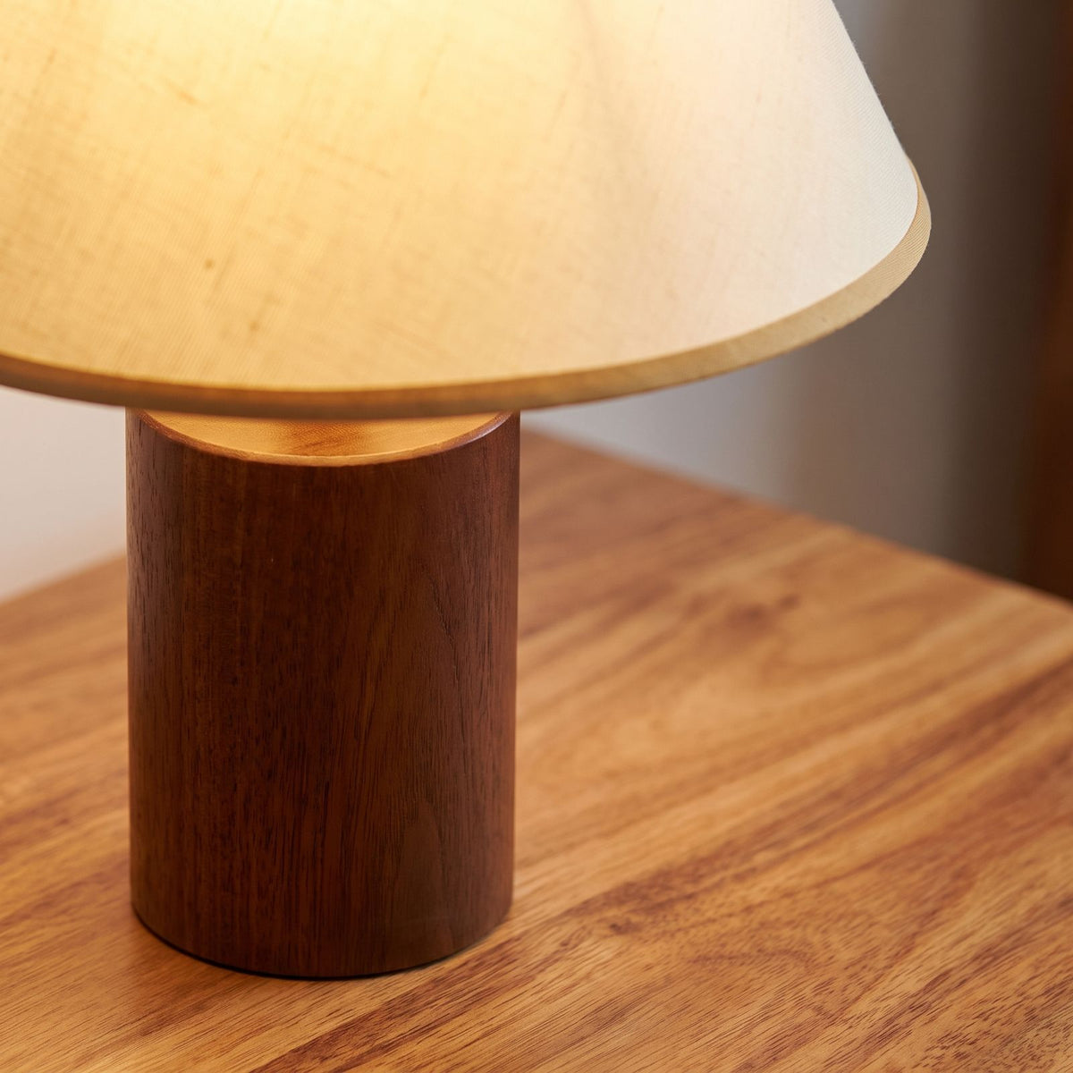 Wood Base Cone Shade Bedside Table Lamp, close view on a timber surface