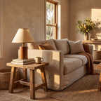 Wood Base Cone Shade Bedside Table Lamp on a side table beside a sofa