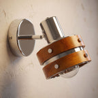 Wood Cylinder Shade Iron Disc Wall Light, close view at 45 degrees on a plaster wall