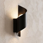 Wrap Around Aluminium and Glass Up Down Wall Light, close view at 45 degrees on a plaster wall