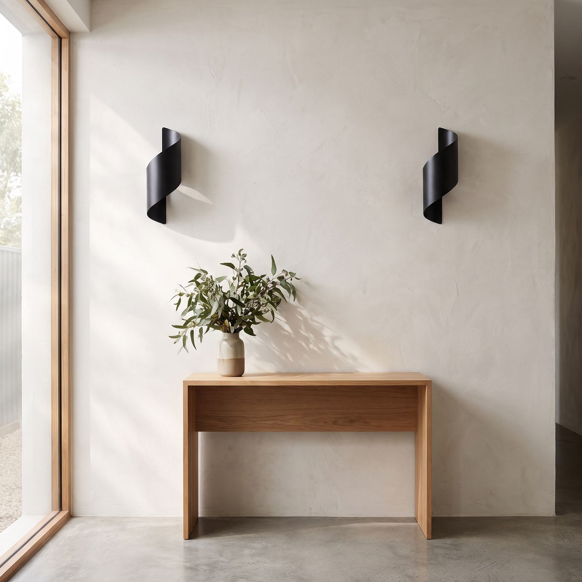 Wrap Around Aluminium and Glass Up Down Wall Light in a pair on a wall of an Australian home