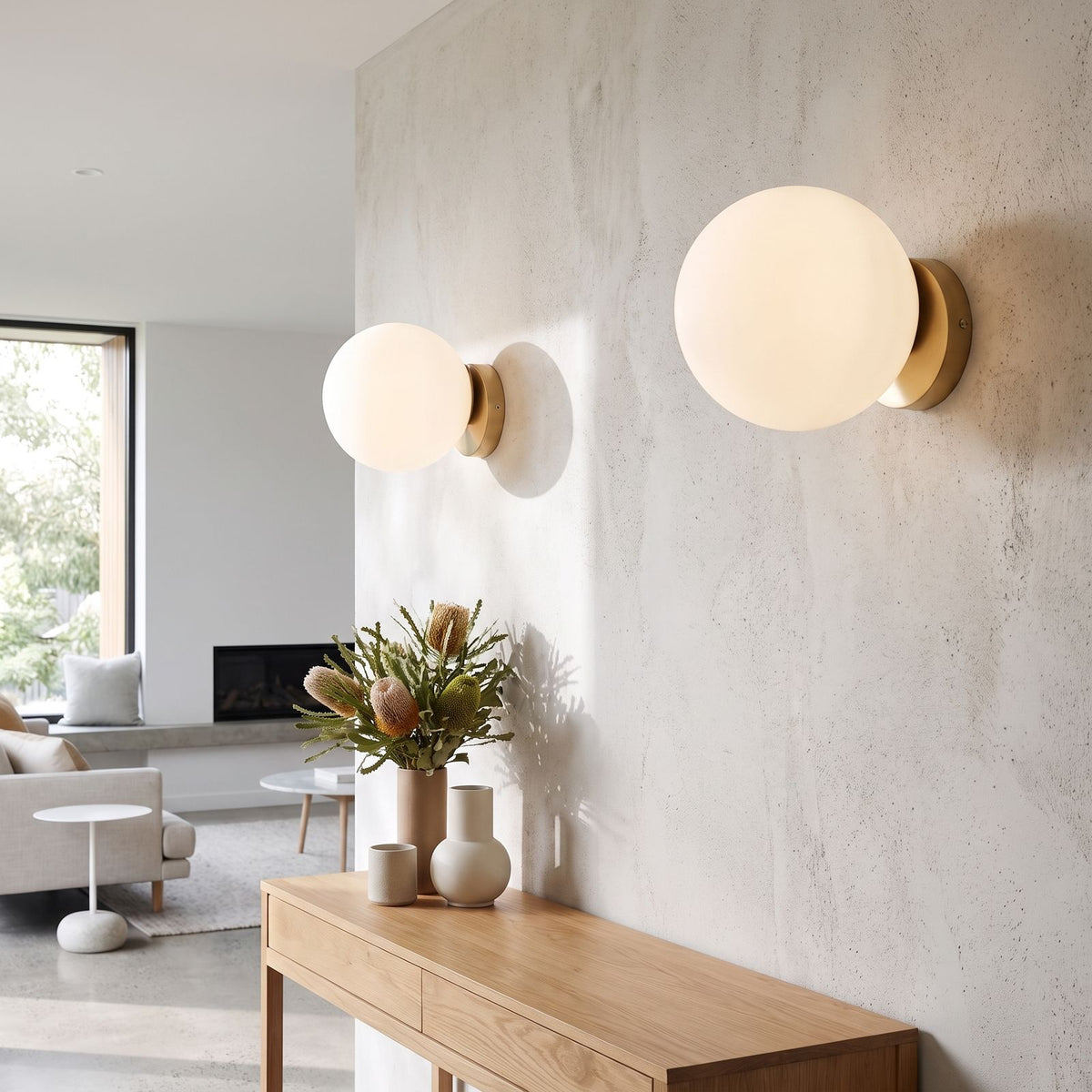 Wrought Iron Frame Glass Shade Wall Light in a pair on a wall of an Australian home