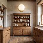 Wrought Iron Frame Glass Shade Wall Light on a kitchen wall